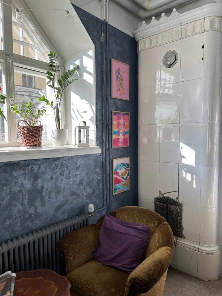 Encanto Art Cafe displaying indoor paintings