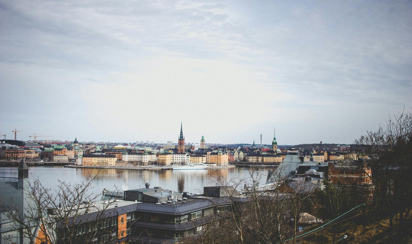 photo of buildings near body of water